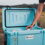 Person grabbing a drink from the Irocker hard cooler | Lifestyle