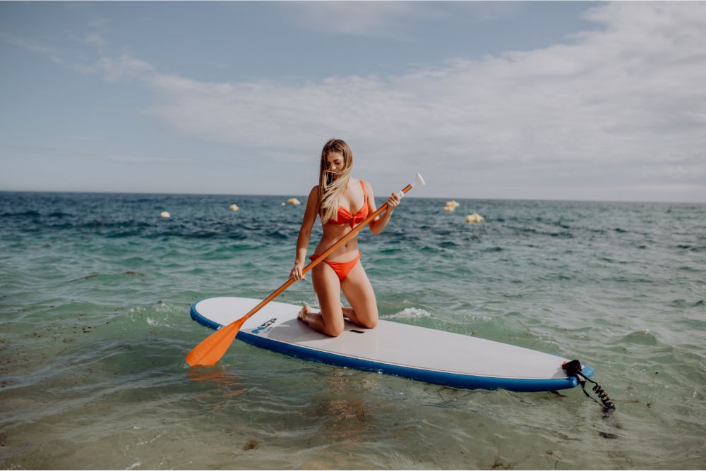 What to Wear Paddle Boarding? Spring, Summer, Fall & Winter